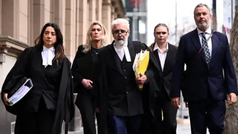 Reuters Patterson's legal team, lead by Richard Edney (centre)