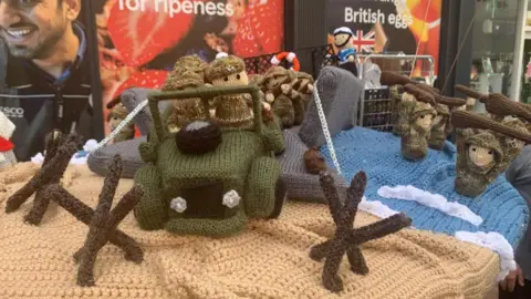 Bridgnorth Town Council Knitted scenes from D-Day on top of a postbox