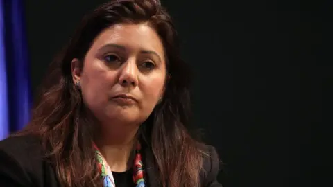Getty Images MP Nusrat Ghani looking at a camera 