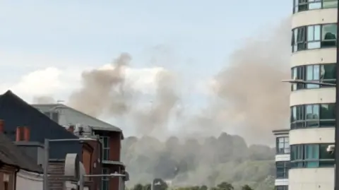 Plumes of smoke from a fire in St Ann's, taken from Heathcoat Street in Nottingham 