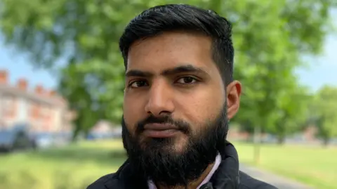 A close-up photograph of Sameer Rafik