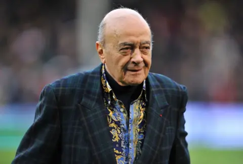 PA Mohamed Al Fayed in a green blazer