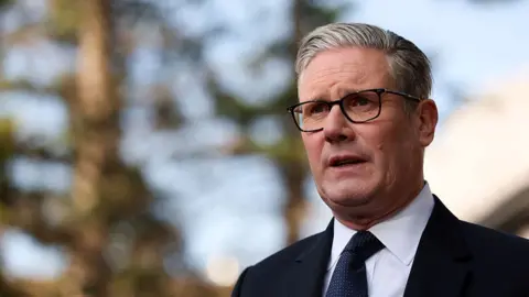 Getty Images UK Prime Minister Sir Keir Starmer speaks to the media during the G7 Leaders Summit on 15 June 2025 in Kananaskis, Canada. 