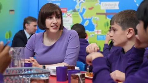 PA Media Education Secretary Bridget Phillipson speaking to children astatine a schoolhouse successful England