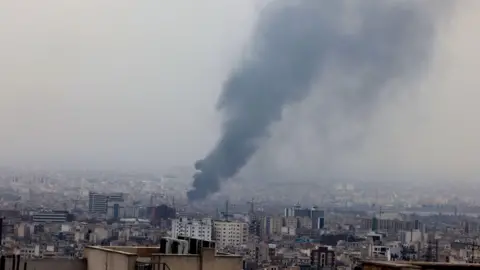 EPA Smoke rising from Tehran's skyline after a missile strike