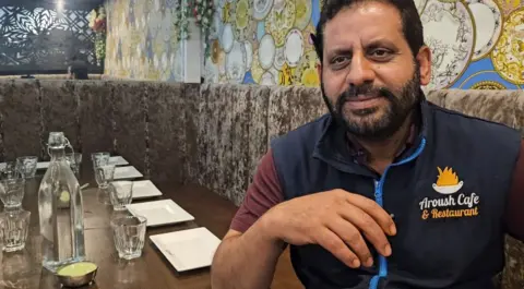 aisha iqbal/bbc Cafe owner Habib Hussain 