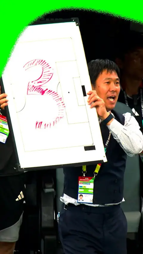 Japan manager Hajime Moriyasu keeps his whiteboard handy