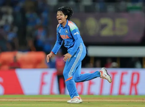 Pankaj Nangia/Getty Images Shafali Verma of India celebrates after taking the wicket of Marizanne Kapp of South Africa (obscured) during the ICC Women's Cricket World Cup India 2025 Final match between India and South Africa at Dr. DY Patil Sports Academy on November 02, 2025 in Navi Mumbai, India. (Photo by Pankaj Nangia/Getty Images)