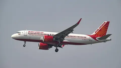 An Airbus A320 aircraft, operated by Air India Ltd., prepares to land at Indira Gandhi International Airport in New Delhi, India, on Saturday, June 14, 2025. 