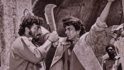 Dinodia Dharmendra with Amjad Khan in Sholay