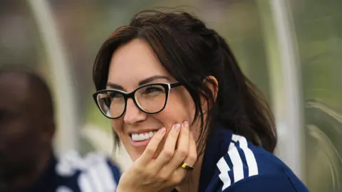 A close up of Dr Suzanne Huurman with her chin rested on her left hand