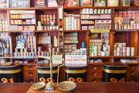 Getty Images Shot of vintage food gathered in a recreation of a shop