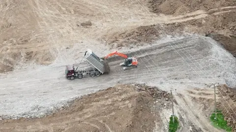 Lorry tipping apparent waste