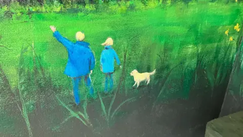 A painting showing a man and woman from behind, waving, and also a yellow coloured dog, against a green background