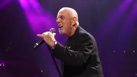 Getty Images Billy Joel performing