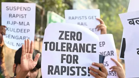 Getty Images A group of women activists gather at Jantar Mantar in protest to oppose the conditional bail granted to former Uttar Pradesh MLA Kuldeep Singh Sengar in the Unnao rape case, on December 28, 2025 in New Delhi, India. 