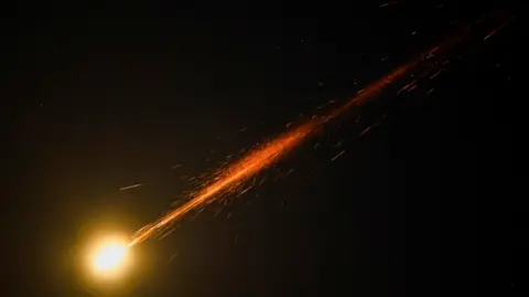 Missiles launched from Iran are intercepted as seen from Ashkelon, Israel