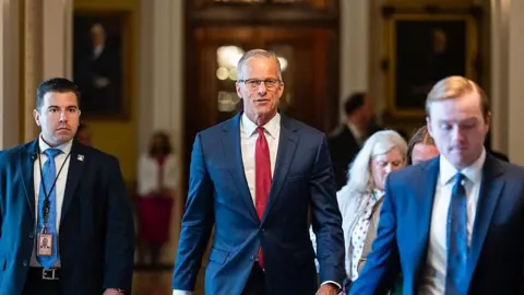 Senate Majority Leader John Thune pictured in the halls of the US Capitol 