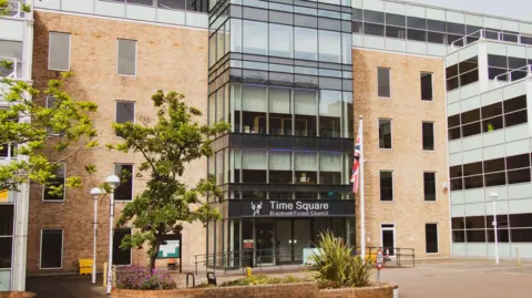 Getty Images A general view picture of Time Square, the headquarters of Bracknell Forest Council, an office building with a small glass frontage.