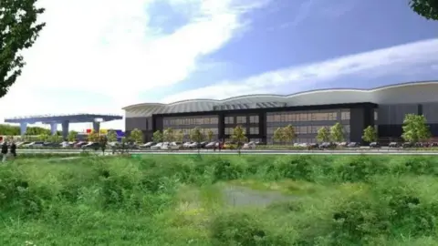 Helioslough Three-storey warehouse buildings with grass in foreground