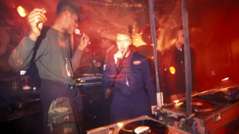 Getty Images Massive Attack performing behind the decks in 1994