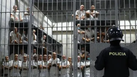 Lissette Lemus / BBC Prisoners in the notorious Cecot maximum security prison in El Salvador