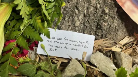 One of the notes left outside the hotel reads: "Thank you for saving my life. And I'm sorry I couldn't do the same for yours. Rest."