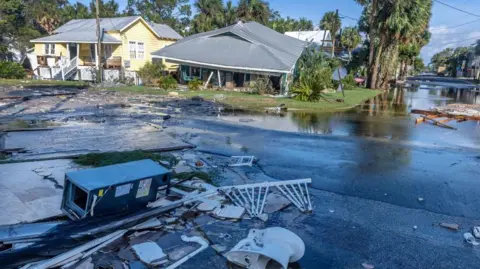  Cristóbal Herrera/EPA-EFE View of damage left behind by Hurricane Helene in Cedar Key, Florida, 