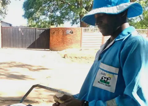 Farai Sevenzo Ice-cream seller Amos Mhere in Harare, Zimbabwe - 3 May 2024