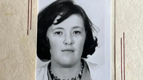 Jan Doyle A black and white passport photo of Jan Doyle