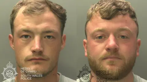 South Wales Police Police custody images of defendants Joseph Dix and Macauley Ruddock. Both are looking at the camera and looking stern. Each of them is wearing a light grey top and both have short brown hair. Dix also has a light beard and moustache