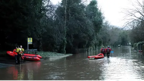 Boats used in flooding evacuations in Didsbury, Manchester