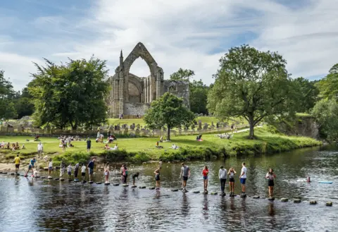 PA Media Stepping stones at Bolton Abbey