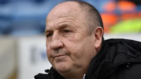 John Coleman watching Gillingham