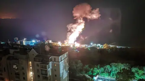 Supplied An explosion seen from a top flat in a high-rise block in Odesa