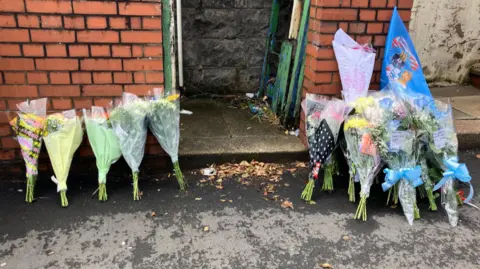 Floral tributes at the roadside