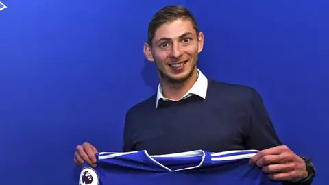 Sala posing with a Cardiff City shirt on 20 January