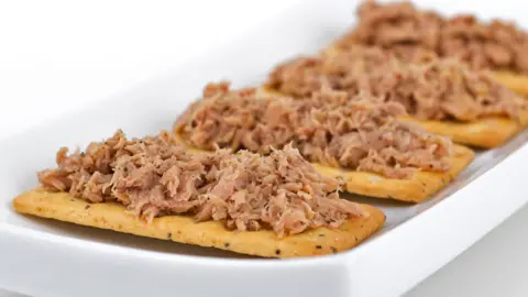 Getty Images Tinned tuna and crackers, file pic