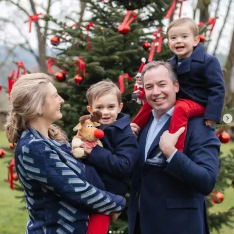 Maison Du Grand-Duc/ Kary Barthelmey The Luxembourg royal family beside a Christmas tree in their Christmas card
