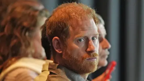 The Duke of Sussex in a close-up. He has a moustache and beard. 