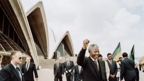 National Archives of Australia Nelson Mandela toured the Opera House in 1990