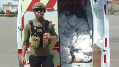 Ryan Williams Ryan Williams with aid van in Ukraine