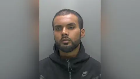 Custody photo of Mohammed Ali 