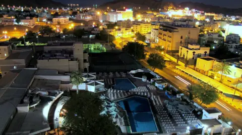 BBC A night view of Muscat, Oman. File photo