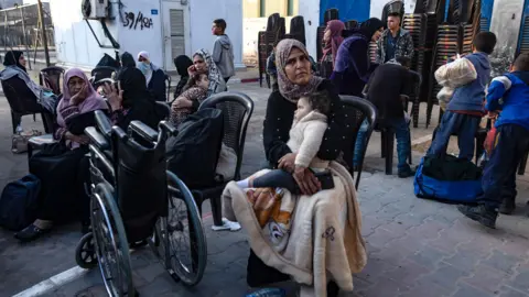 EPA Palestinian patients hold   earlier  an evacuation organized by the World Health Organization (WHO) astatine  the European Hospital successful  Khan Younis, successful  the confederate  Gaza Strip, (6 November 2024)