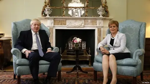 PA Media Boris Johnson and Nicola Sturgeon meeting in 2019