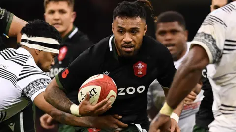 Willis Halaholo takes on Fiji for Wales in 2021