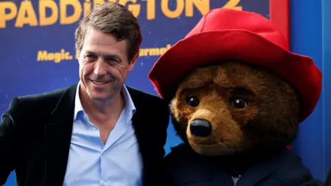 Reuters Hugh Grant and Paddington