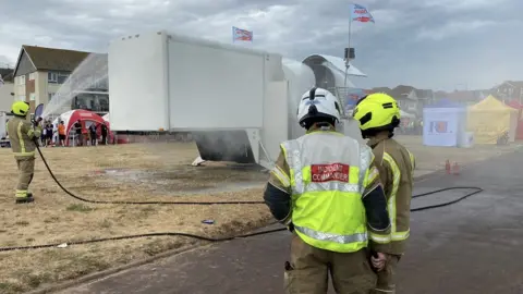 Essex Fire and Rescue Service Firefighters tackle blaze at airshow