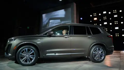 Getty Images Cadillac's new XT6 crossover is revealed at the Garden Theater during the 2019 Detroit Auto Show in Detroit, Michigan, on January 13, 2019, one day before the start of the North American International Auto Show.